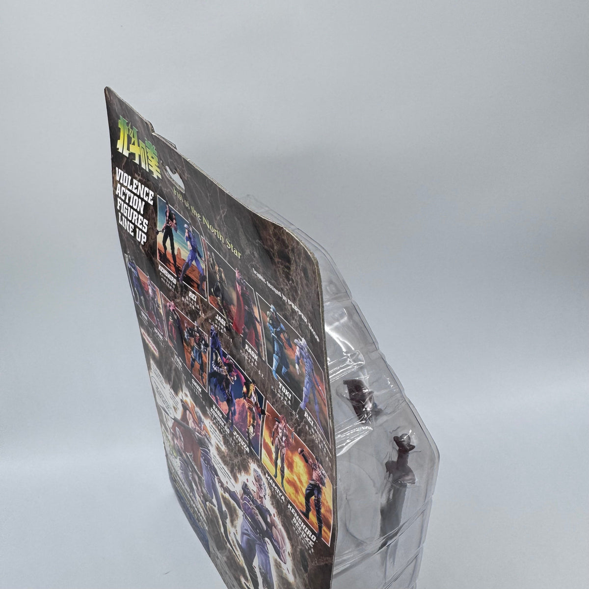 Souther action figure back side view showing card warp