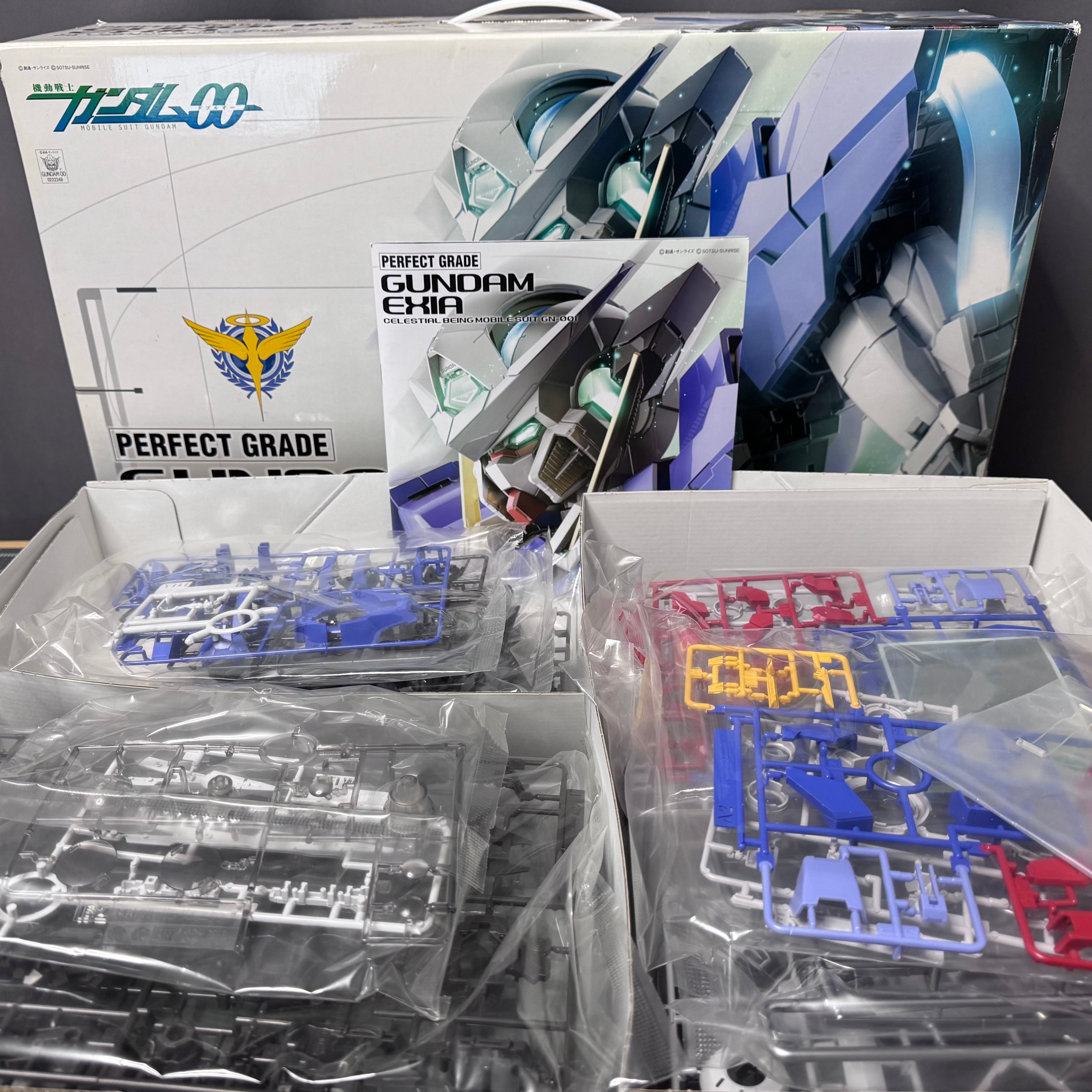 Bandai Perfect Grade Gundam Exia GN-001 1/60 Scale Model Kit – New Unbuilt (Open Box)