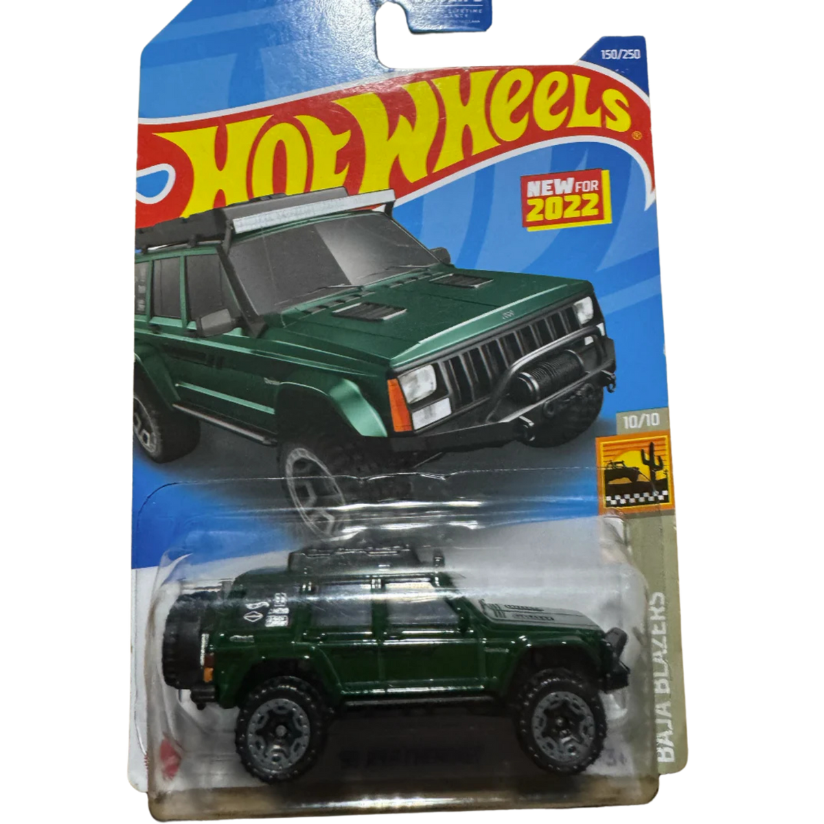 Hot Wheels '95 Jeep Cherokee in green 2022 Baja Blazers series.